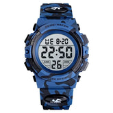 Blue digital watch with camouflage pattern on a white background, featuring the Skmei brand.