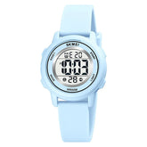 Light blue digital watch with white display on a white background, featuring the Skmei brand.