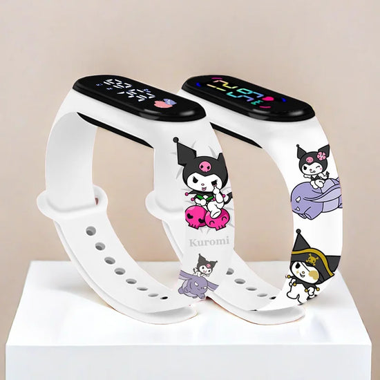 White smartwatch bands with cartoon character design on a beige background